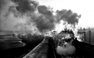 Q6 restarts from signals with loaded coal wagons; West Hartlepool