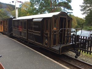 On Saturday17th October 2015 Ffestiniog Railway Brakevan No 7 (built 2004 as a replica of the 1873 Brown Marshall & Co van) is seen on the rear of the Vintage Train at Tan-y-Bwlch. This was a special train for Statesman Rail.