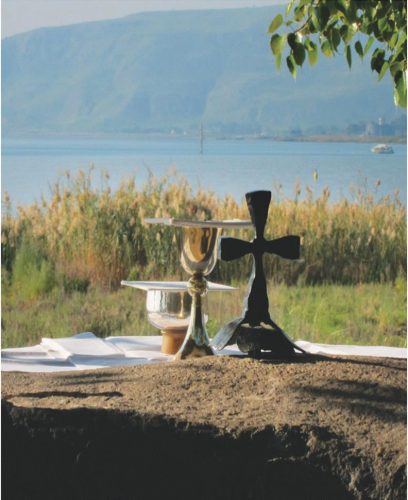 Communion silver laid out on the grass